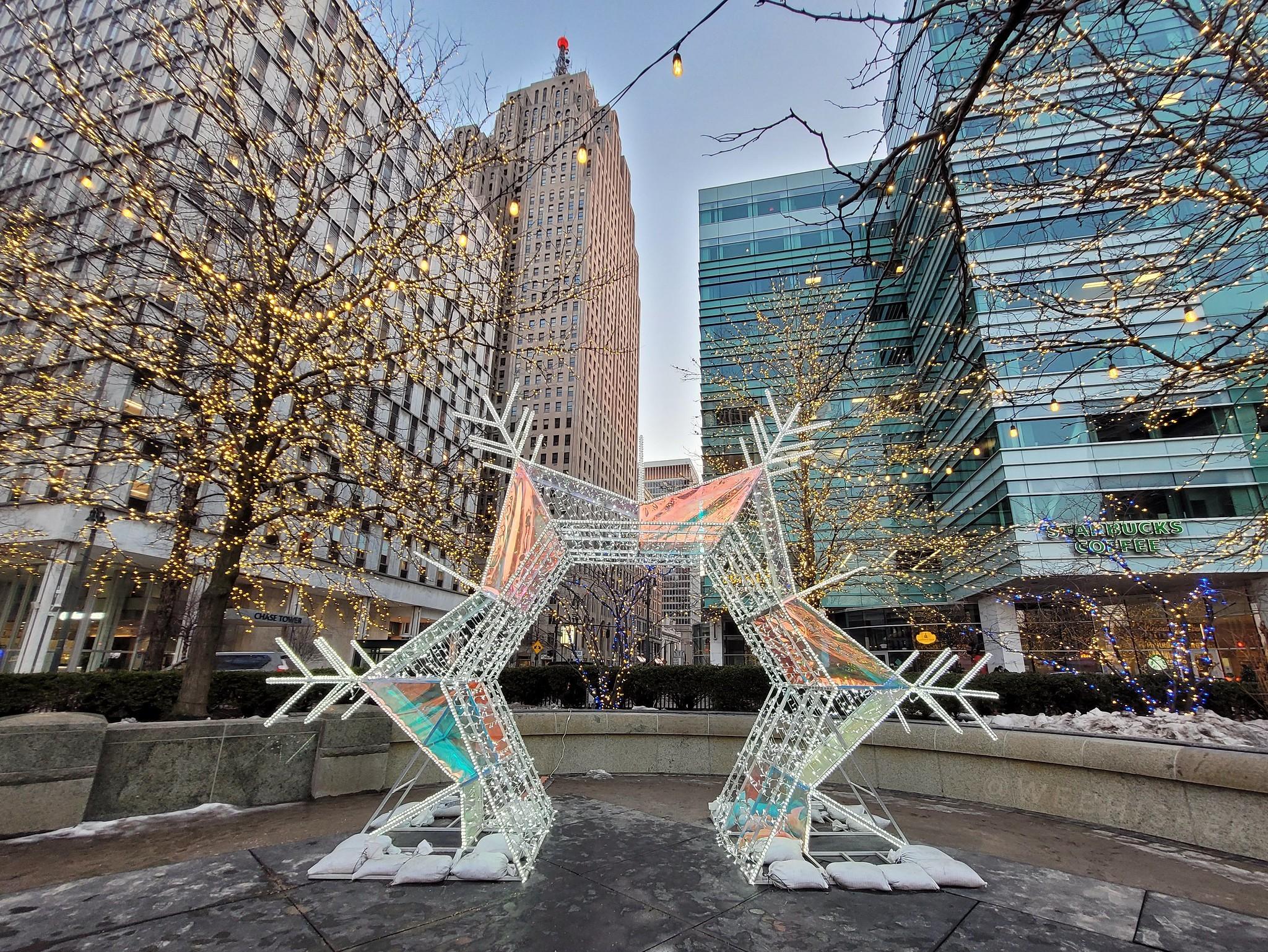 Detroit Holiday Lights 2025 Riverwalk glowing ice sculptures.