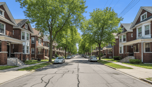 A row of brick residential homes representing Section 8 housing in Detroit neighborhoods