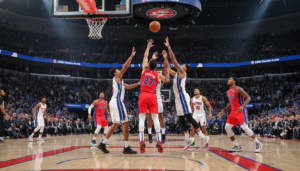 Detroit Pistons players in action during a home game at Little Caesars Arena