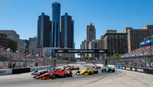 Race cars on the downtown circuit under the sunny Metro Detroit weather forecast.